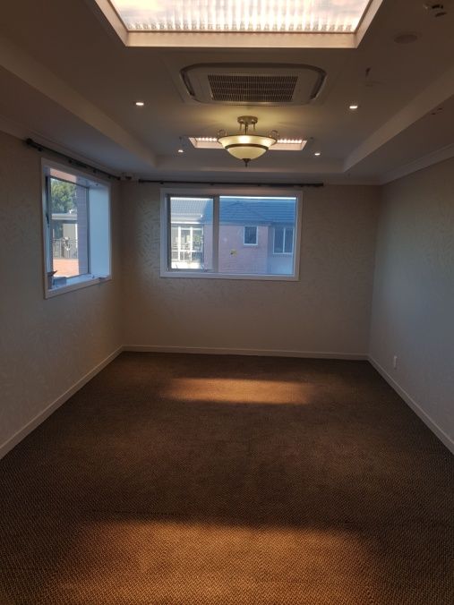 Aged care resident room artificial skylight set to warm 2500K