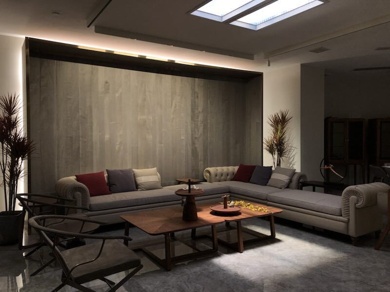 Two static cloud skylights above a modern villa living room, giving an open-plan space daylight without relying on the surrounding windows alone.