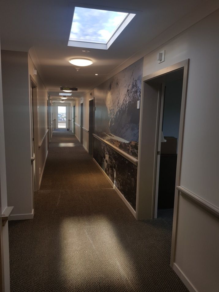 1200x600mm artificial skylight above a corridor in a retirement village, giving the hallway a daylit feel and helping residents keep a sense of day and night in a windowless space.